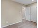 Neutral bedroom featuring wood-look floors, a closet, and connection to adjacent spaces at 515 Culloden Ct, Charlotte, NC 28214