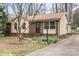 Charming home with brick and vinyl siding, complemented by lush landscaping at 515 Culloden Ct, Charlotte, NC 28214