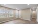 Open living area with new floors, neutral walls, recessed lighting, and a view of the front yard at 515 Culloden Ct, Charlotte, NC 28214