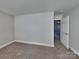 Comfortable carpeted bedroom with a view of a doorway at 5513 Hammermill Dr, Harrisburg, NC 28075