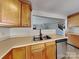Well-equipped kitchen featuring stainless steel appliances and a view of the adjacent living space at 5513 Hammermill Dr, Harrisburg, NC 28075