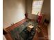 Bedroom features a window, hardwood floors, and neutral-colored walls at 5635 Ruth Dr, Charlotte, NC 28215