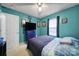 Cozy bedroom features a large dresser, a window with dark curtains, and a comfy queen-size bed at 609 Ben Rich St, Dallas, NC 28034