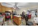 Functional kitchen featuring wooden cabinets, a central island, and modern stainless steel appliances at 609 Ben Rich St, Dallas, NC 28034