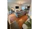 Spacious living room with hardwood floors, large sectional sofa, and modern décor at 645 Beaty St, Davidson, NC 28036