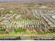 Aerial view of community with manicured lawns and mature trees at 7147 Brighton Park Dr, Mint Hill, NC 28227