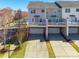 Townhouse with attached garages and private balconies at 7147 Brighton Park Dr, Mint Hill, NC 28227