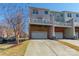 Townhouse with attached garages and private balconies at 7147 Brighton Park Dr, Mint Hill, NC 28227
