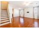 Spacious living room with hardwood floors, modern fixtures, and abundant natural light at 7147 Brighton Park Dr, Mint Hill, NC 28227