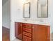 Stylish primary bathroom with a double sink vanity, quartz counters and modern fixtures at 7147 Brighton Park Dr, Mint Hill, NC 28227