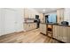 Kitchen with granite countertop island and white cabinets offering ample storage at 7219 Morningdew Ct, Denver, NC 28037