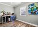 Inviting sitting area featuring beverage coolers, wine storage and natural light at 7219 Morningdew Ct, Denver, NC 28037