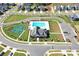 Aerial view of community pool, club house, pickle ball and tennis courts at 8231 Annsborough Nw Dr, Concord, NC 28027