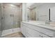 Elegant bathroom with a double sink vanity, quartz counters, and a glass-enclosed shower at 844 Westminster Dr, Statesville, NC 28677