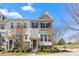 Charming townhome showcasing stone accents, a neutral palette, and a welcoming front entrance at 9108 Ainslie Downs St, Charlotte, NC 28273