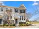 Charming townhome showcasing stone accents, a neutral palette, and a welcoming front entrance at 9108 Ainslie Downs St, Charlotte, NC 28273