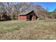 Weathered barn with a collapsing roof and missing siding at 966 Marys Grove Rd, Cherryville, NC 28021