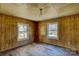 Wood paneled room with two windows allowing natural light at 966 Marys Grove Rd, Cherryville, NC 28021
