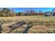 Large lot with sparse grass and a shed on the right at 966 Marys Grove Rd, Cherryville, NC 28021