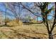 Landscaped lawn with mature trees on a sunny day at 966 Marys Grove Rd, Cherryville, NC 28021