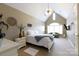 Bright bedroom with vaulted ceilings, carpet floors and lots of natural light at 1038 Rolling Park Ln, Fort Mill, SC 29715