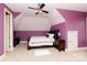 Bedroom featuring purple accent walls, carpet floors, a ceiling fan and ample natural light at 1038 Rolling Park Ln, Fort Mill, SC 29715