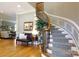 Elegant foyer with hardwood floors, a curved staircase, and decorative accents at 1038 Rolling Park Ln, Fort Mill, SC 29715