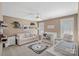 Cozy bedroom with comfortable sofa and neutral decor at 105 Elizabeth Brook Dr, Davidson, NC 28036