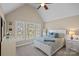Bedroom with vaulted ceilings and multiple windows at 105 Elizabeth Brook Dr, Davidson, NC 28036