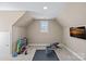 Exercise room with TV and workout bench at 105 Elizabeth Brook Dr, Davidson, NC 28036