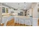 Modern kitchen with white cabinets, stainless steel appliances, and granite countertops at 105 Elizabeth Brook Dr, Davidson, NC 28036