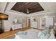 Bright main bedroom features a wood ceiling, hardwood floors, and neutral paint at 105 Elizabeth Brook Dr, Davidson, NC 28036