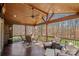 Covered porch with outdoor seating and ceiling fan at 105 Elizabeth Brook Dr, Davidson, NC 28036