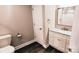 Bathroom features a toilet and vanity with granite countertop and white cabinetry at 1123 Fieldstone Rd, Mooresville, NC 28115