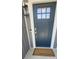 Close-up of a stylish front door with a 'welcome home' mat at 1123 Fieldstone Rd, Mooresville, NC 28115