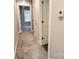 Hallway showcasing neutral carpet and white trim for a clean, welcoming transition between rooms at 1123 Fieldstone Rd, Mooresville, NC 28115