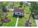 Overhead aerial view of the home, manicured lawns and surrounding trees with partial views of nearby properties at 113 Windsong Ct, Gastonia, NC 28056