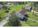 Aerial view showcasing the home's location, manicured lawn, and proximity to neighboring properties at 113 Windsong Ct, Gastonia, NC 28056