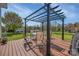 Back yard featuring a deck with pergola, a large lawn and privacy at 113 Windsong Ct, Gastonia, NC 28056