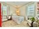 Cozy bedroom with natural light, neutral walls and charming decor at 113 Windsong Ct, Gastonia, NC 28056