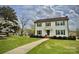 Charming two-story home with a well-manicured lawn and beautiful landscaping at 113 Windsong Ct, Gastonia, NC 28056
