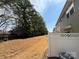 Large lot with mature trees and privacy fence in the backyard at 13615 Browhill Ln, Charlotte, NC 28278