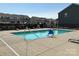 Community pool featuring a lift and plenty of lounge chairs at 13615 Browhill Ln, Charlotte, NC 28278