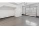 Spacious two car garage with epoxy floor, garage door opener, and lots of natural light at 1409 Kenilworth Ave, Charlotte, NC 28203