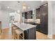 Modern kitchen with granite countertops, stainless steel appliances, and stylish pendant lighting at 1409 Kenilworth Ave, Charlotte, NC 28203