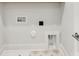 Bare bones laundry hook up at 1409 Kenilworth Ave, Charlotte, NC 28203