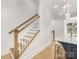 Bright staircase features hardwood steps, white risers, and a wood railing at 1409 Kenilworth Ave, Charlotte, NC 28203