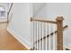 Stylish stairway with wood railings and white spindles at 1409 Kenilworth Ave, Charlotte, NC 28203