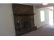 Living room with a brick fireplace and mantel, enhancing the home's charm at 1629 & 1631 Harris Rd # 6&7, Fort Mill, SC 29708
