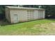 Garage with three doors and green grass at 1629 & 1631 Harris Rd # 6&7, Fort Mill, SC 29708